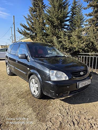 kia r17: Kia Carens, qara rəng, 5 qapılı MPV/miniven. - dizel mühərriki, ön — 2