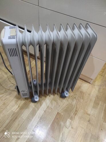 Elektrikli qızdırıcılar və radiatorlar: Radyator PANASONIK xaricden alinib uzerinde fenide var bir nece ay