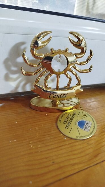 mixek gulunun adi: Svarovski qaşlı,qızılı suya batırılmış, paslanmayan poladdandir.10aznə