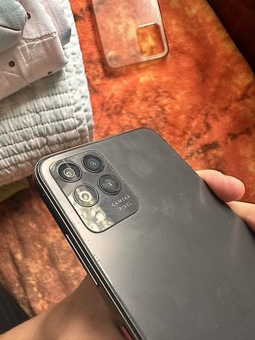 Мобильные телефоны и аксессуары: Смартфон T-Mobile pro 5G (брендированный логотипом T) в черном цвете — 7