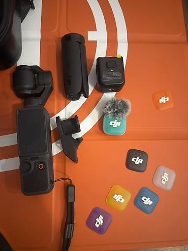 наушники с переводчиком: DJI Osmo Pocket 4 + комплект аксессуаров Компактная карманная камера — 1