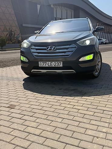 niva pikap satilir: Hyundai Santa Fe krossover modeli təqdim olunur. Avtomobil tünd boz — 1