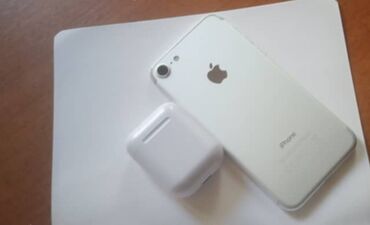 наушник от айфона: IPhone 7, Жаңы, 32 ГБ, Ак, Каптама, Кулакчындар, Заряддоочу түзүлүш, 76 %