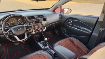 Kia: Kia Pride: 1.4 l | 2013 il Sedan — 15