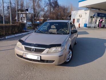 мазда димио: Mazda 323: 2001 г., 1.5 л, Автомат, Бензин, Седан