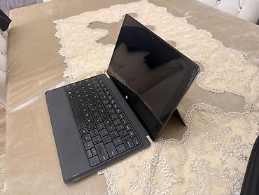 Digər noutbuklar və netbuklar: Microsoft Surface planşet-noutbuk hibridi Xüsusiyyətlər: - Ekran — 7
