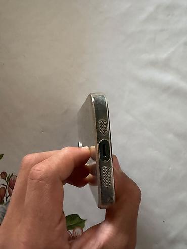 Смартфон Apple iPhone (линейка 13), зелёный цвет корпуса. Особенности