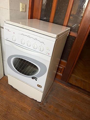 mikrodalqalı soba: Gefest 3100-06 qaz plitəsi və qaz sobası - 4 qaz ocağı: 1 böyük, 2 — 2