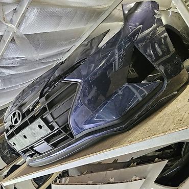 Передний бампер в сборе для Hyundai (оригинальный). Синий цвет