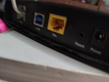 balaca printer: TP-Link simsiz marşrutlaşdırıcı + Pirelli PRG A1010 modem Məhsul — 4