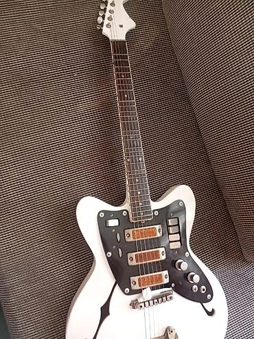 Elektro gitaralar: Elektron gitara, 6 sim, İşlənmiş, Ünvandan götürmə — 1