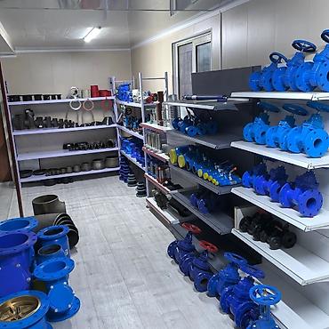 Известь: Задвижка чугунная 30ч6бр (Ру 10/16) — Фланцевая, с выдвижным шпинделем — 12