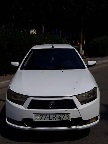 turbo az uvaz: Ağ rəngli sedan avtomobil Xarici: - Ağ gövdə, arxa park sensorları - — 7