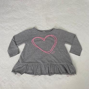 tn kids: Bluza-tunika za bebe
Nije puno nosena,u ok stanju
Velicina 12 mes — 6