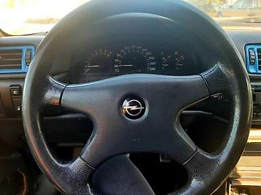 pezo 1: VOLAN OPEL CALIBRA ORGINALAN | Dobro stanje ne uvrce se — 2
