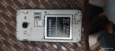 deri çanta: Samsung Galaxy J1 2016, 2 GB, rəng - Qara, İki sim kartlı — 2