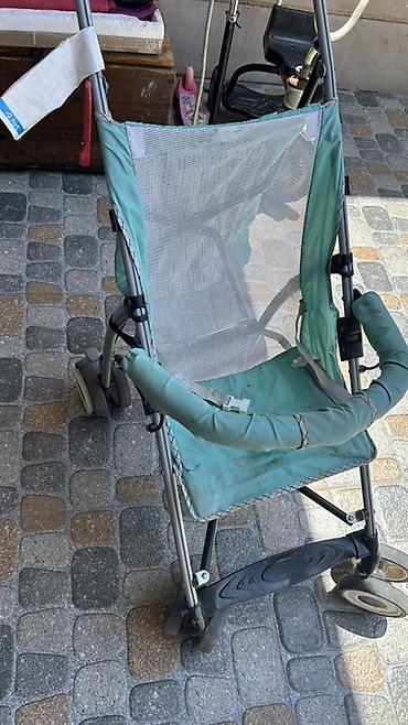 Yüngül “umbrella” tipli uşaq arabası - Korpus: metal çərçivə, kompakt