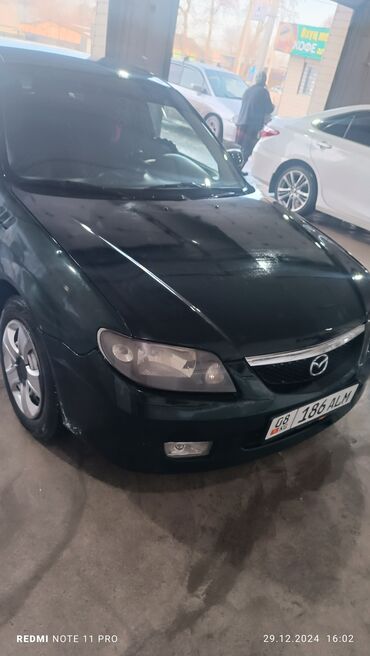 Mazda: Mazda 323: 2002 г., 1.6 л, Механика, Бензин, Хэтчбэк