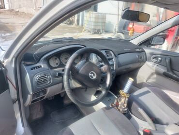 койго алмашам: Mazda 323: 2003 г., 2 л, Механика, Дизель, Хетчбек