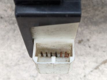 Другие детали салона: Кнопка люка Митсубиси. Оригинал б/у, из Германии, привозной. Подходит — 6