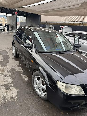maxda demio: Mazda 323: 2001 г., Механика, Бензин, Хэтчбэк — 5