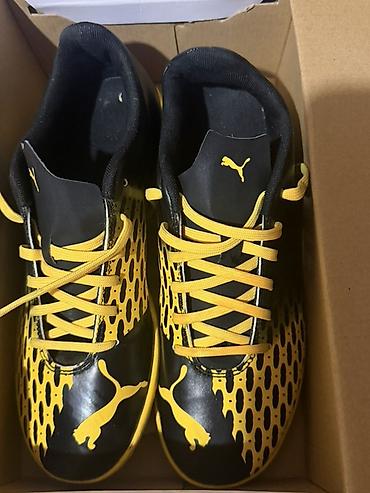 sari batinka: Puma futbol butsaları – sarı/qara rəng kombinasiyası Model kodu — 1