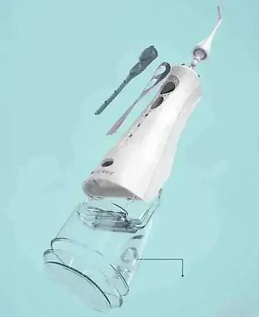 Elektronika: Oralni irigator – punjivi, rezervoar 230 ml Savršen saveznik za — 4