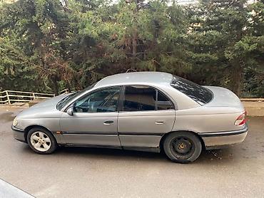 opel omega: Opel Omega: 2.5 l | 1994 il Sedan — 8