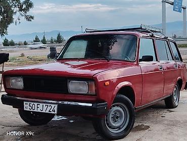 masin led: VAZ 2104, universal kuzov, qırmızı rəng. Xüsusiyyətlər: - Kuzov: 5 — 2