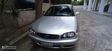 Toyota Corolla: 1.4 l | 2001 year Limousine