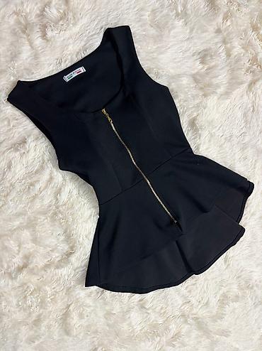 sapa u srcu: Elegantna crna peplum bluza bez rukava - Materijal: glatka tkanina sa — 1