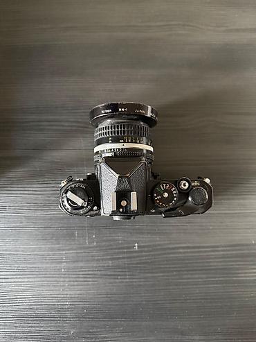 nikon 50mm: Analog lent ile Nikon FE fotoaparat. Uzerinde Ideal veziyyetde Nikkor — 5
