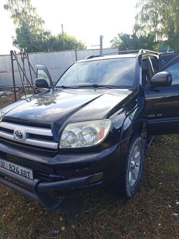 мотоцикл кытай: Черный внедорожник Toyota 4Runner с пятью дверьми, рейлингами на крыше