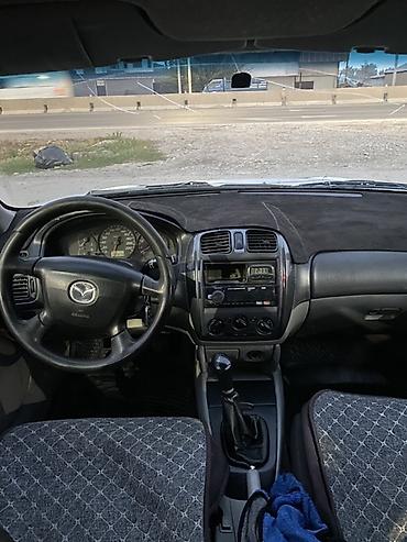 Продажа авто: Mazda 323: 2002 г., 1.6 л, Механика, Бензин, Универсал — 8