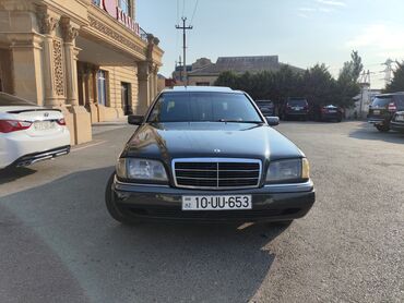 Cadillac: Mercedes-Benz 200: 2 л | 1994 г. Седан