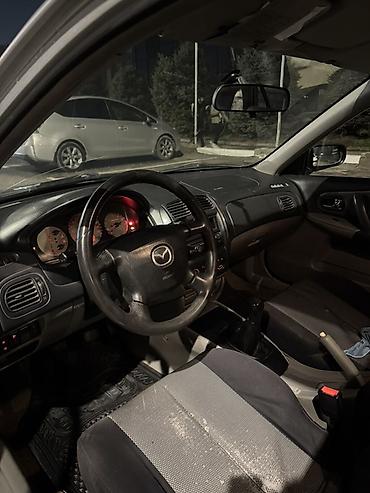 mazda 626 2002: Mazda 323: 2002 г., 1.6 л, Механика, Бензин, Универсал — 4