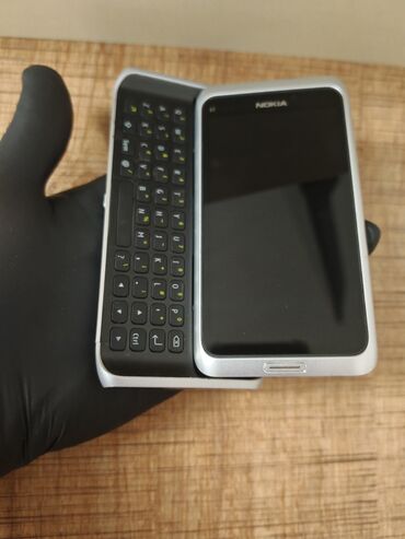 Nokia: Nokia E7, 16 GB, rəng - Gümüşü, Sensor — 9