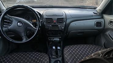 левый руль машина: Nissan Almera: 2000 г., Автомат, Бензин, Хэтчбэк — 5