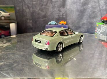 Avtomobil modelləri: Коллекционная модель Maserati Quattroporte V light green 2005 — 8