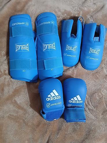 Əlcəklər: 3ay istifade edib.L razmer 45m alinib 25m satilir karate geyimide var — 1