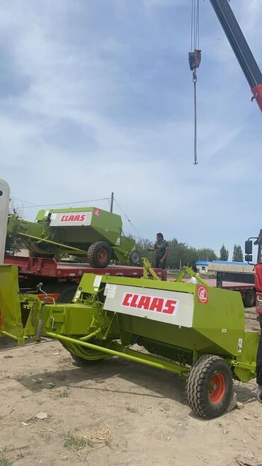 Транспорт: Пресс-подборщик Claas предназначен для подбора валков сена, соломы и