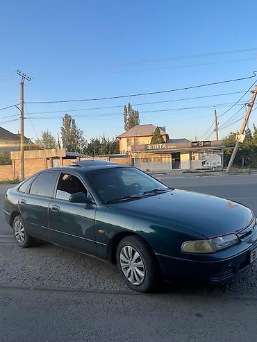 боз белер: Mazda 626: 1999 г., Кол менен иштөөчү, Седан — 4