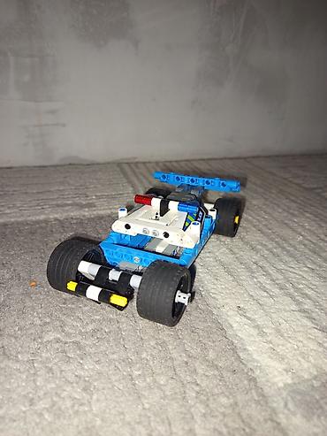 кукла купить: Конструктор LEGO Technic — полицейский гоночный автомобиль - Модель — 1