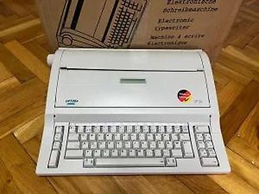 Ostali kućni aparati: Elektronska pisaća mašina OPTIMA SP 24 (Made in Germany) - — 13