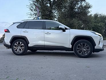 кызыл кия кыз: Toyota RAV4: 2022 г., 2.5 л, Гибрид, Кроссовер — 7