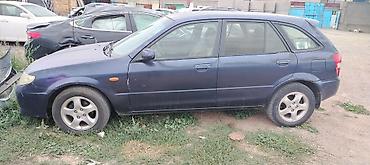 кажы сай: Mazda 323: 2001 г., 1.6 л, Кол менен иштөөчү, Бензин, Универсал — 2