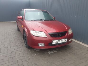 Mazda: Mazda 323: 2001 г., 1.5 л, Автомат, Бензин, Седан