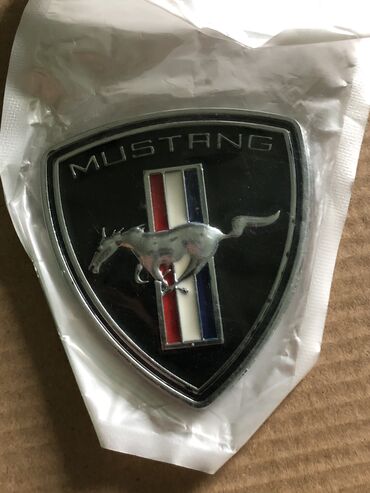 Другой тюнинг: Логотип Mustang металлический на двухстороннем скотче. Новый