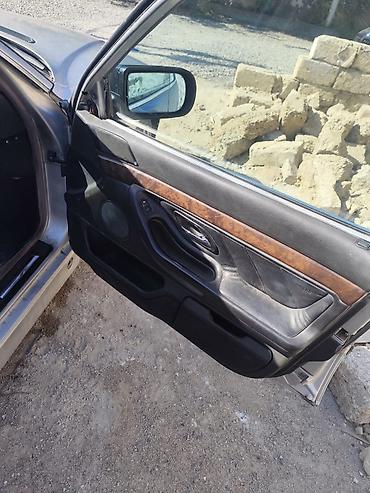 elektrikli mataskilet: BMW 7 Series (E38) sedan – gümüşü rəngdə. Texniki və dizayn — 4