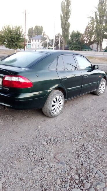 селхоз техники: Mazda 626: 2000 г., 2 л, Механика, Бензин, Хэтчбэк
